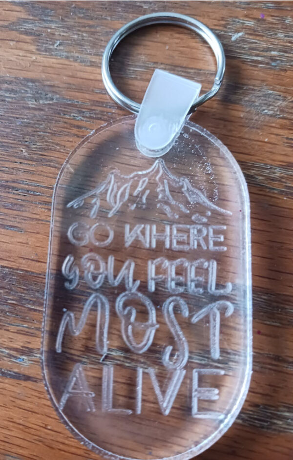 Go where you feel most alive Acrylic keychain